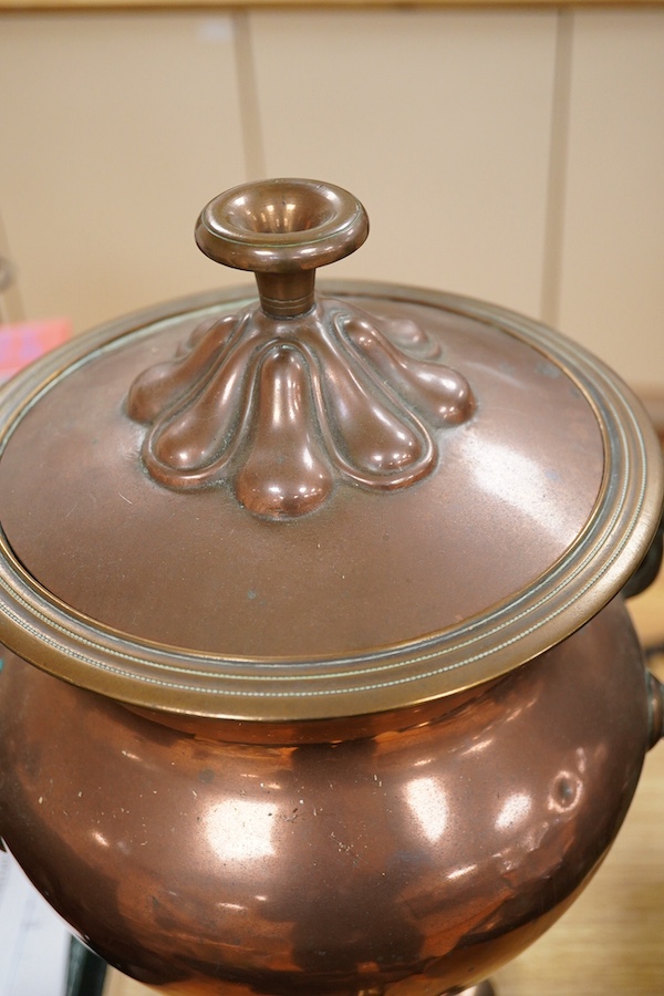 An early 20th century copper tea urn, 45cm. Condition- fair to good